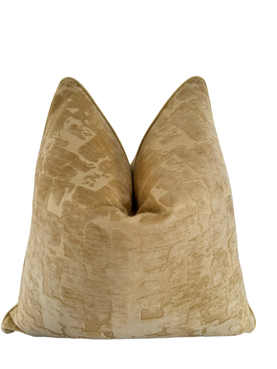 luxury scatter cushion in luxe textured fabric , warm gold amber colour tones.