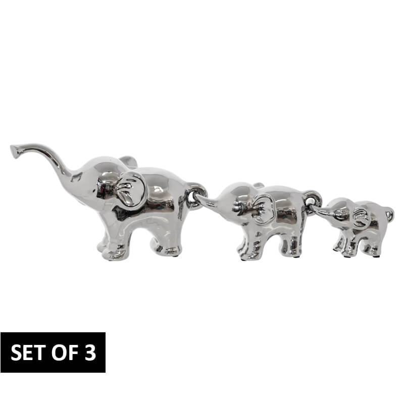Set of three silver elephant figurines 
